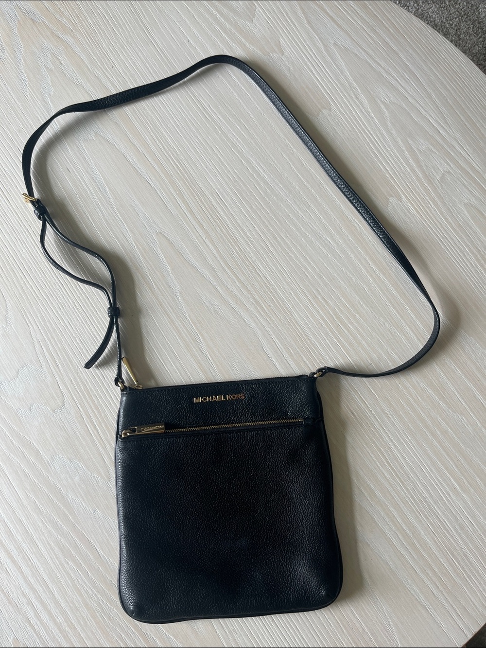 Michael Kors Black Leather Crossbody Pouch with Gold Accents